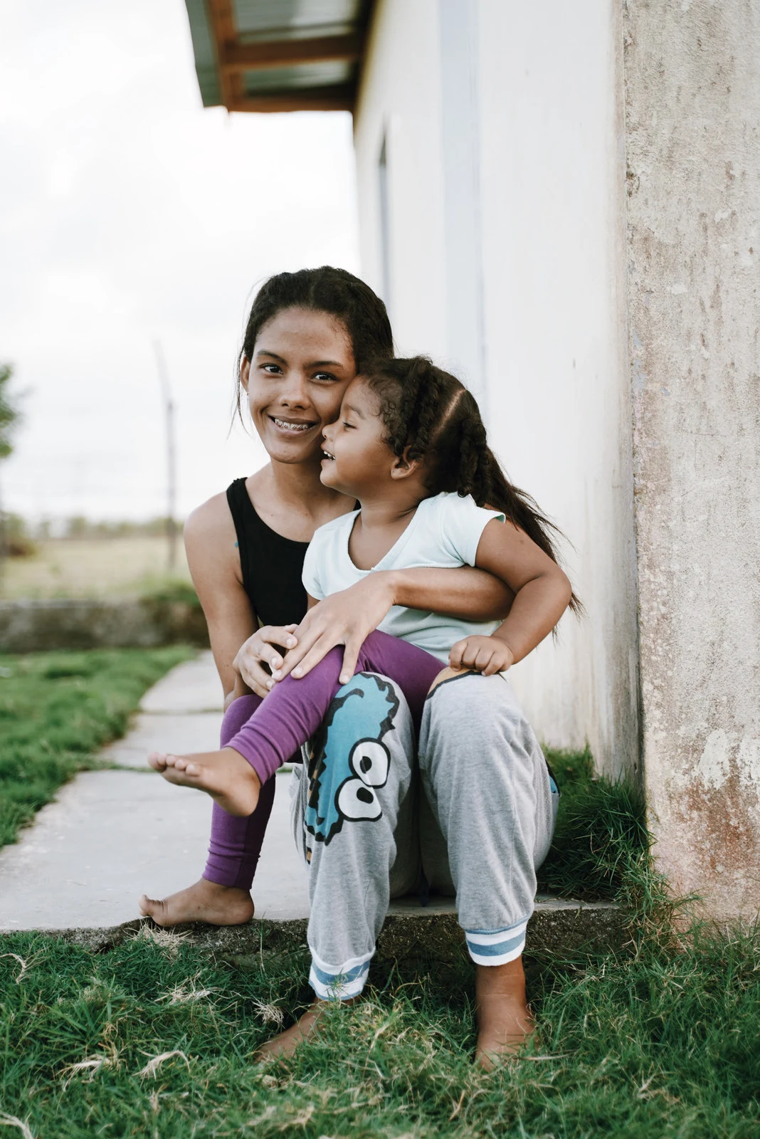 A mother holding her child