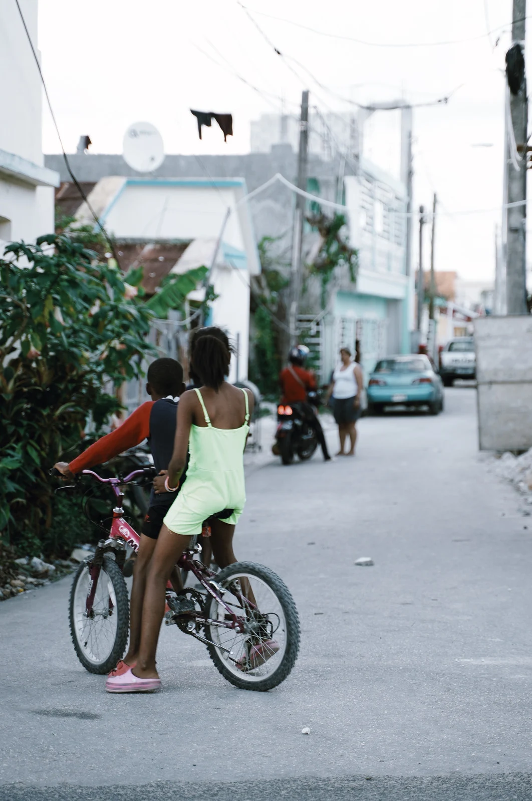 A quiet street with people walking